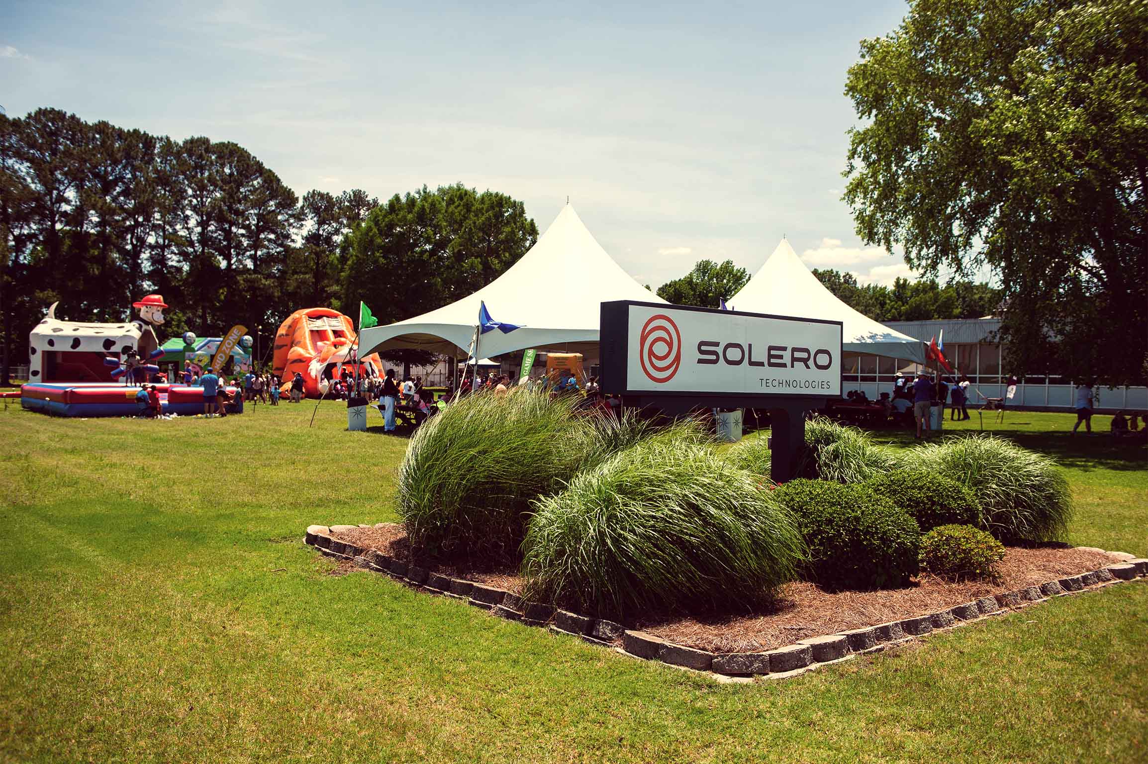 Carnival on the front lawn of the Water Valley office and factory