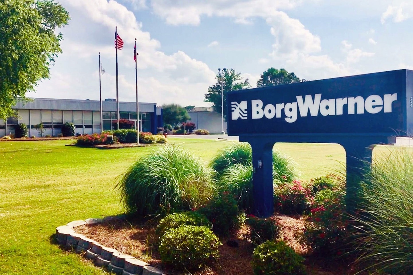 Historic photo with BorgWarner signage